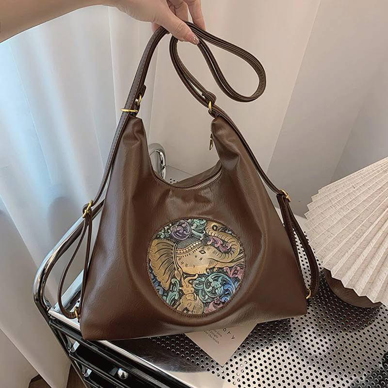 October2025 - Patched boho varsity bag