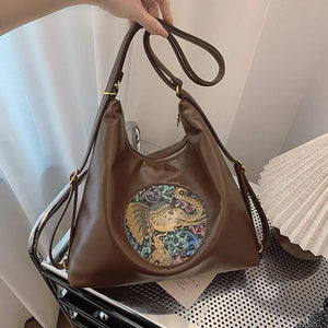 October2025 - Patched boho varsity bag